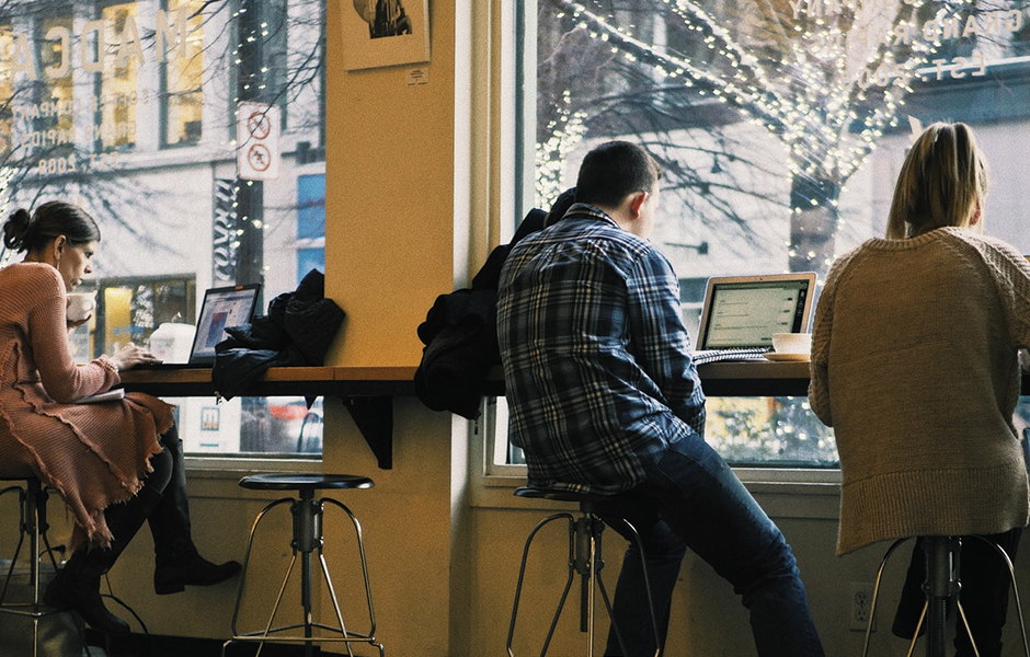 remote workers in coffee shop